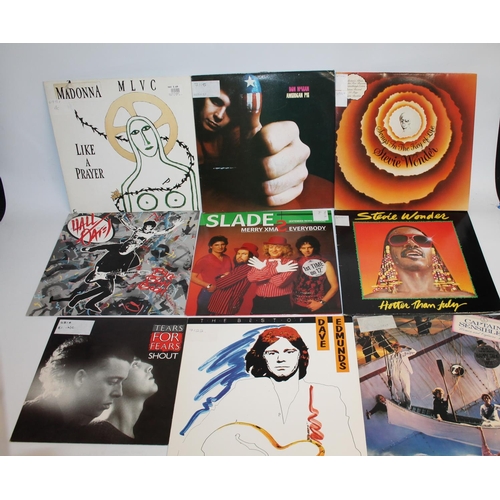 331 - Large collection of mainly 80's records to include Stevie Wonder, Madonna, Steve Miller Band, 10CC, ... 