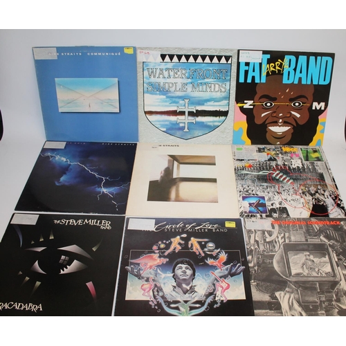 331 - Large collection of mainly 80's records to include Stevie Wonder, Madonna, Steve Miller Band, 10CC, ... 