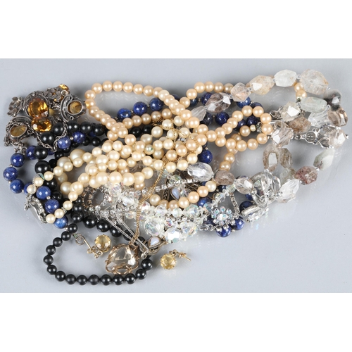 105 - Assorted costume jewellery; mainly necklaces