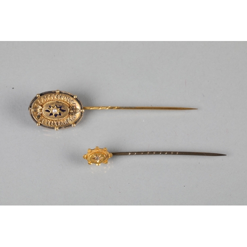 110 - 9 carat yellow gold Etruscan style tie pun; together with one other similar (2)