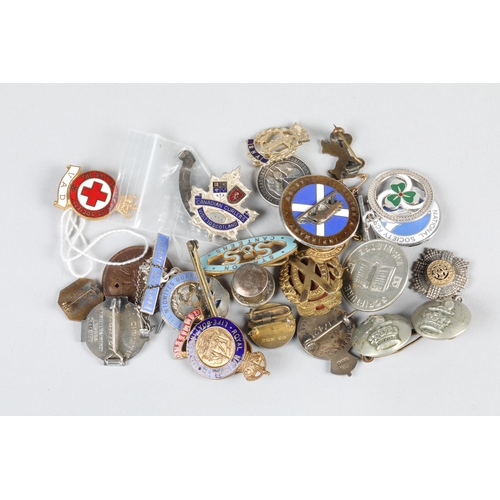 115 - Assorted lot of silver Nurses badges; together assorted badges and military Sweetheart brooches