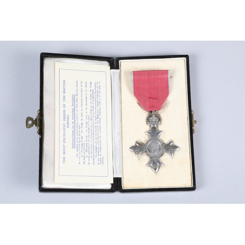 122 - Cased full size George V OBE medal; with ribbon