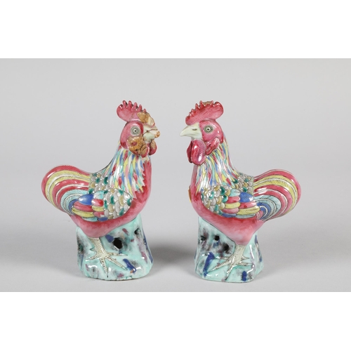 19 - Pair of late 19th / early 20th century Chinese painted porcelain Cockerels; 17cm high