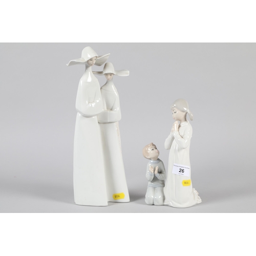 26 - Two Lladro porcelain figures; Two children praying and two Nuns; marks to base; marks to base