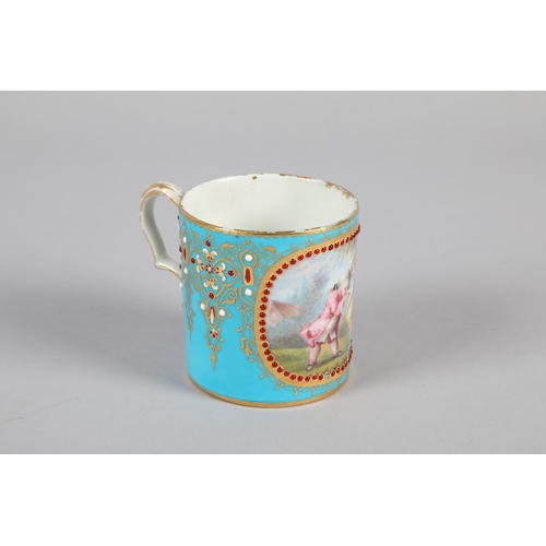 32 - Serves style porcelain tankard; decorated with a panel of children; marks to base; 7.5cm high