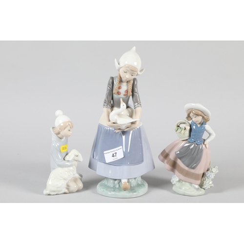 47 - Three Lladro porcelain figures; Lady with Goose; Girl with Basket of Flowers and a Girl with a Sheep... 