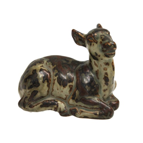 62 - Royal Copenhagen seated fawn model 20183, signed KK to base for Knud Kyhn, 10cm.