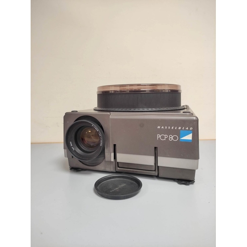 223 - Vintage Hasselblad PCP 80 medium format projector with Zeiss Planar f150mm lens. Also to include two... 