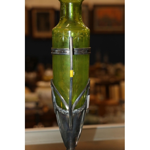 100Q - WMF art nouveau style green glass vase within twin handled white metal holder, 29cm.