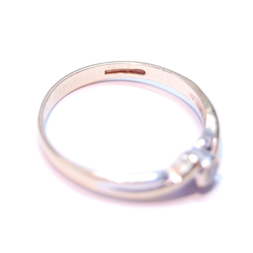 36 - Diamond solitaire ring with collet-set brilliant, in 18ct gold, size P, 1.6g.