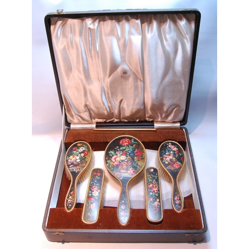 66 - Unusual frosted silver gilt six-piece toilet set painted with vases of flowers and similar sprays, w... 