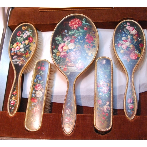 66 - Unusual frosted silver gilt six-piece toilet set painted with vases of flowers and similar sprays, w... 