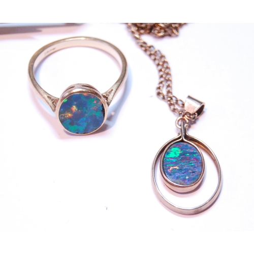 73 - Opal doublet bar brooch, a similar ring, '18ct', and a pendant.