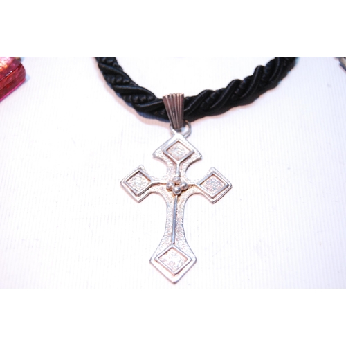 78 - Silver cross pendant, another with beads and silver panels, and various other items by Joanna Repton... 