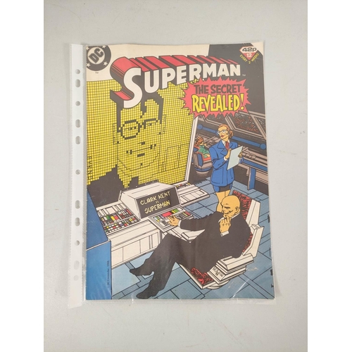 104 - Carton containing a selection of twenty five various 1980s Superman comics and nine The Superheroes ... 