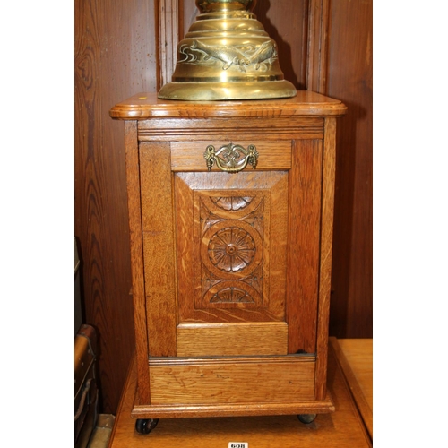 502 - 19th century oak purdonium, with carved flower motif, 54cm high.