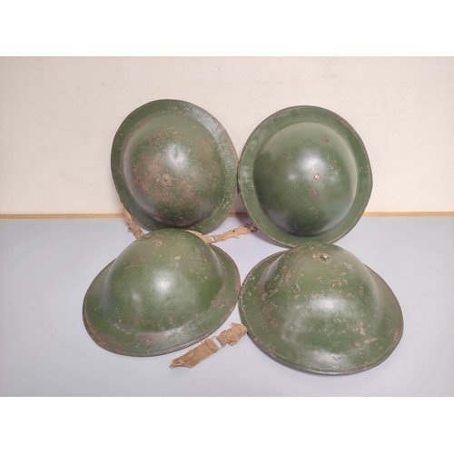 Four WW2 era British Commonwealth MK II Brodie helmets with