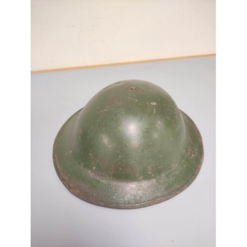 Four WW2 era British Commonwealth MK II Brodie helmets with