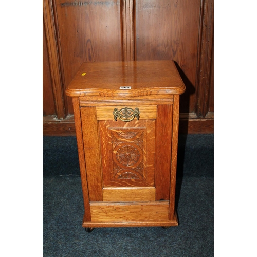 502 - 19th century oak purdonium, with carved flower motif, 54cm high.