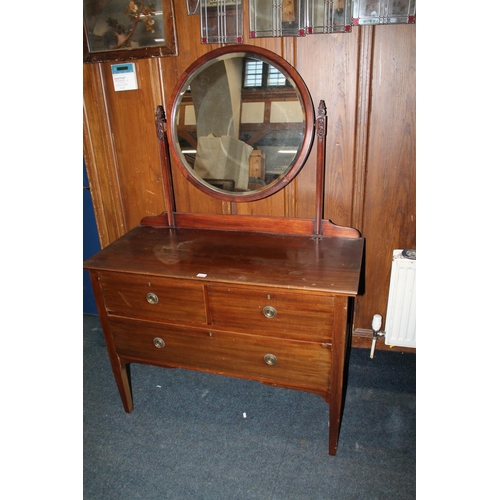 512 - Mahogany dressing table with circular mirror top, above two frieze drawers over one long drawer, rai... 