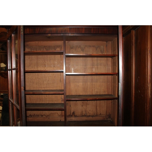 516 - Antique mahogany bookcase, the moulded cornice above a pair of astragal glazed doors, above base uni... 