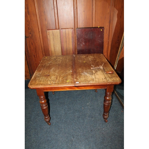 517 - Antique mahogany telescopic dining table, with three additional leaves, raised on turned supports cl... 