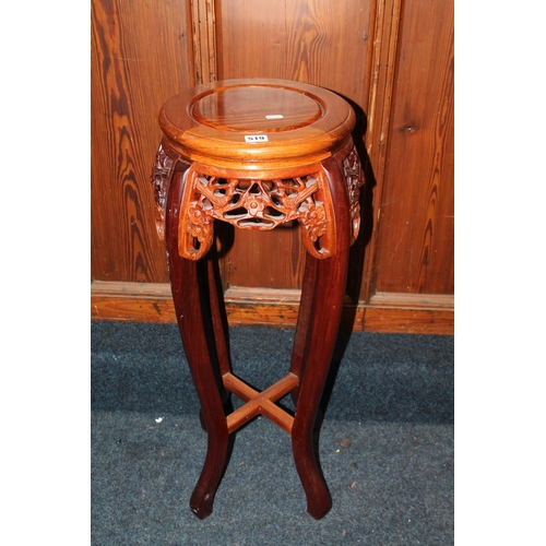 519 - Chinese Cherrywood jardinière stand, with carved and pierced frieze, 81cm high.