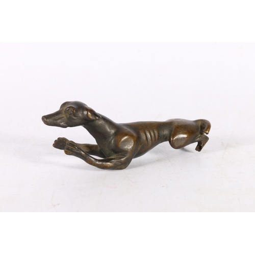 125D - Small bronze model of a greyhound, 10cm.