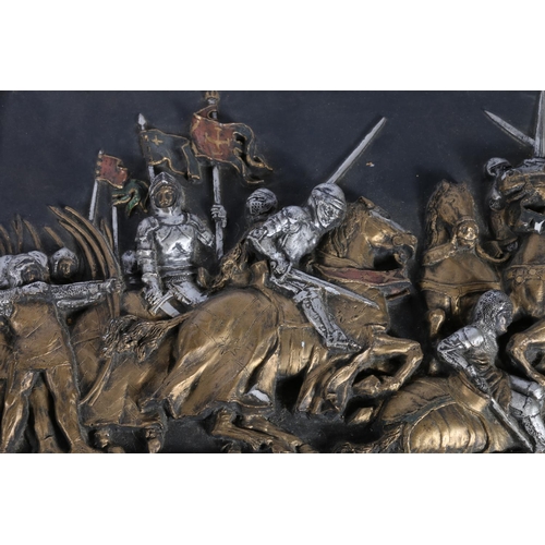 41 - Pair of plaster plaques depicting knights on horseback in battle, each measure 33cm x 23cm.