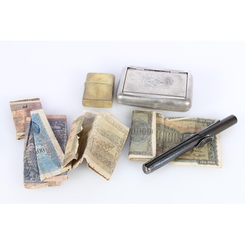 499 - Collection of banknotes, a lighter and a cigarette case.