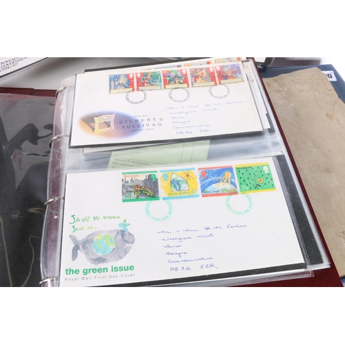 500 - An album of Royal Mail mint stamp presentation packs and two Beatrix Potter stitched stamp books (to... 