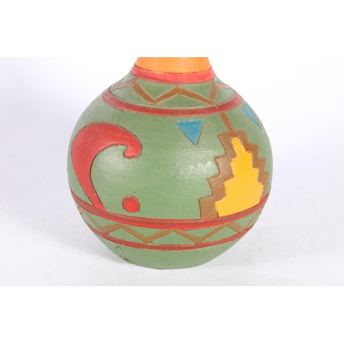 58 - Terracotta vase painted in bright colours, 20cm.