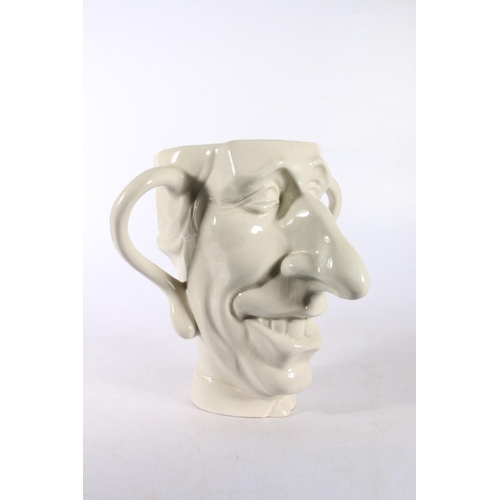 72 - Fluck & Law Carlton ware spitting image twin handled loving cup, modelled as King Charles, 19cm.