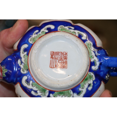 237 - Small teapots, red seal marks to base, cups, saucers, a squat vase with oriental decoration.