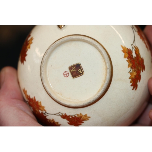 237 - Small teapots, red seal marks to base, cups, saucers, a squat vase with oriental decoration.