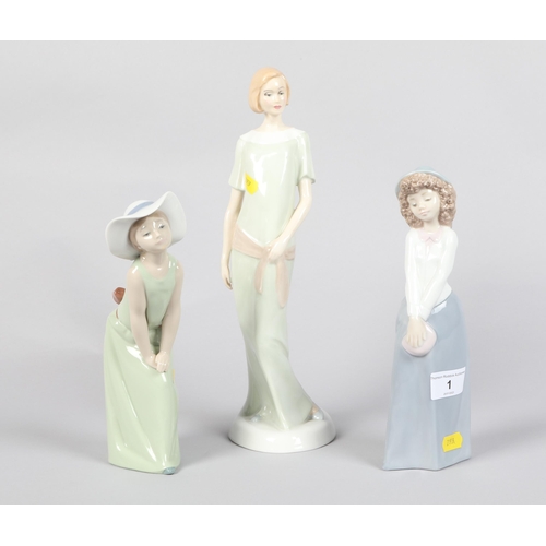 1 - Royal Doulton Reflections; Enigma HN3110; 31cm high; together with two Spanish porcelain ladies (3)