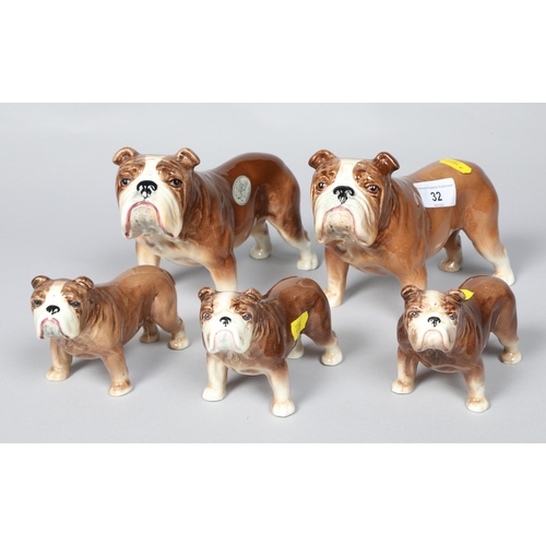 32 - Set of five painted Sylvac pottery dogs; impressed marks to base; tallest 14cm high