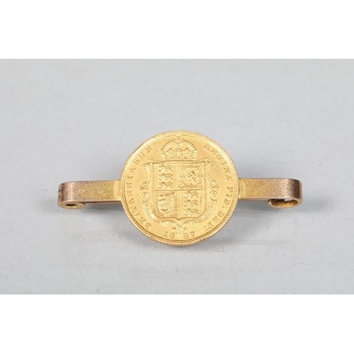 74 - Victorian half Sovereign; dated 1887; mounted as a brooch; 6.2g 4cm long