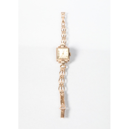 76 - 9 carat yellow gold ladies wristwatch and strap;  14.6g gross weight