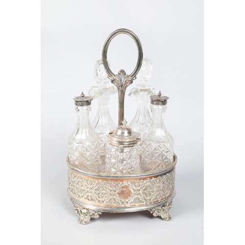 214 - 20th century silver plated cruet / bottle stand; with five cut glass bottles; raised on scroll suppo... 