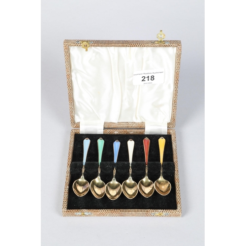 218 - Cased set of six Harlequin enameled teaspoons; 9.5cm long 