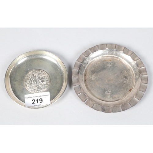 219 - Contemporary hallmarked silver pin dish; 11.5cm wide; together with an Arabic white metal pin dish; ... 