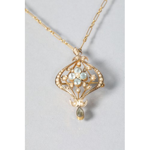 69 - 9 carat yellow gold seed pearl and aquamarine set pendant; on 9 carat chain; 6.7g gross weight