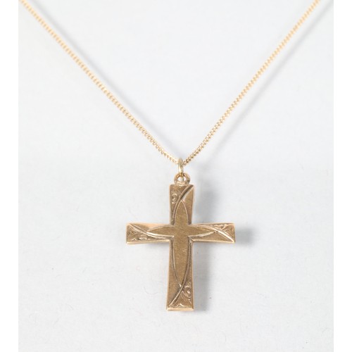 47 - 9 carat yellow gold cross pendant on a 9 carat yellow gold chain; 4.1g gross weight