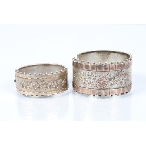 102 - Victorian hallmarked silver and mixed metal hinged bangle; Birmingham 1894; together with one simila... 