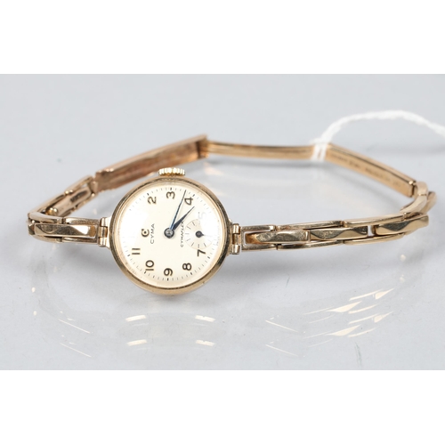 103 - 1930s ladies Cyma gold plated wristwatch; with Arabic numerals and subsidiary second hand dial