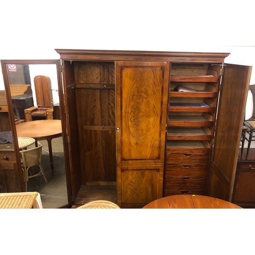 617 - Victorian mahogany three drawer gentlemens wardrobe; with dentil cornice; opening to reveal slides a... 