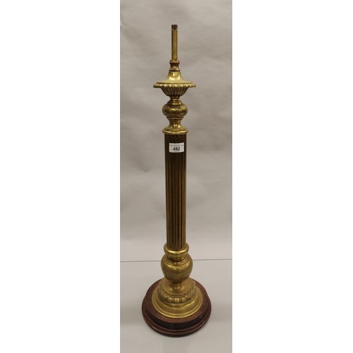 482 - Fluted brass column lamp base; raised on turned hardwood base; 75cm high