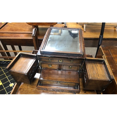 538 - Early 20th century Chinese Rosewood travelling vanity stand; with carved decoration; 25cm wide