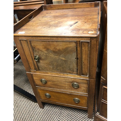 537 - George III mahogany pot cupboard; raised on on two drawers raised on square supports; 49cm wide